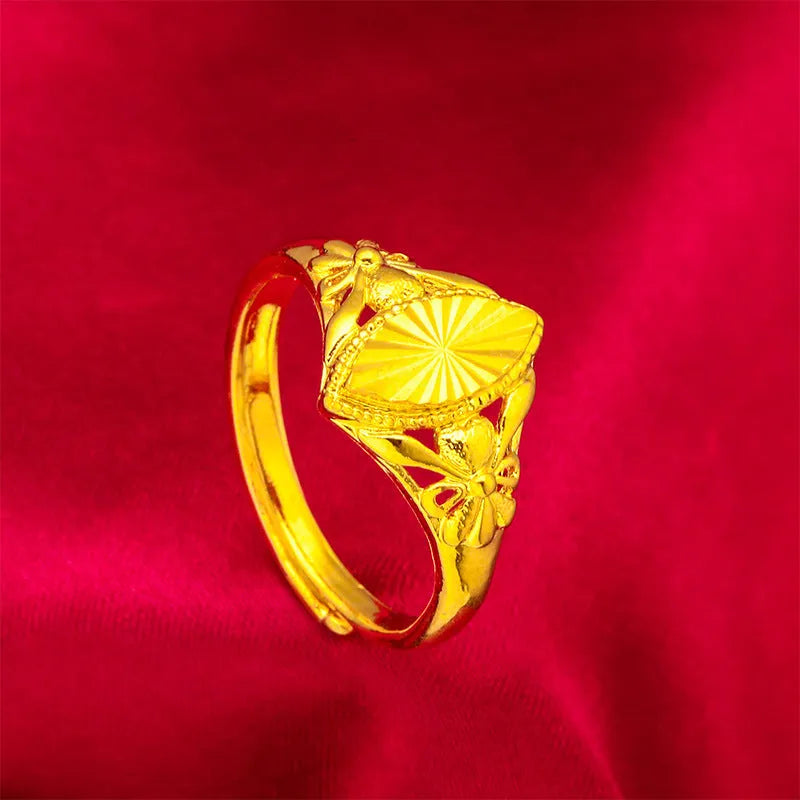 Alluvial gold open diamond flower ring with geometric textured design on brass with electroplated finish.