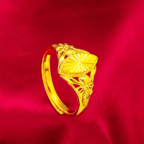 Alluvial gold open diamond flower ring with geometric textured design on brass with electroplated finish.