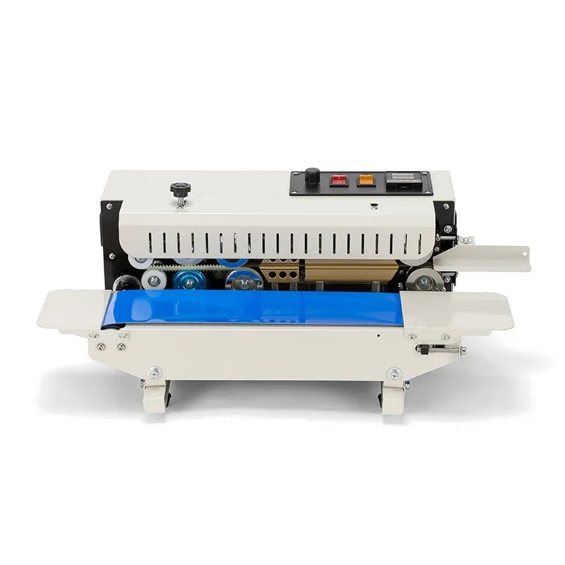 Mini handheld plastic bag sealing machine with integrated date printer on a kitchen counter.