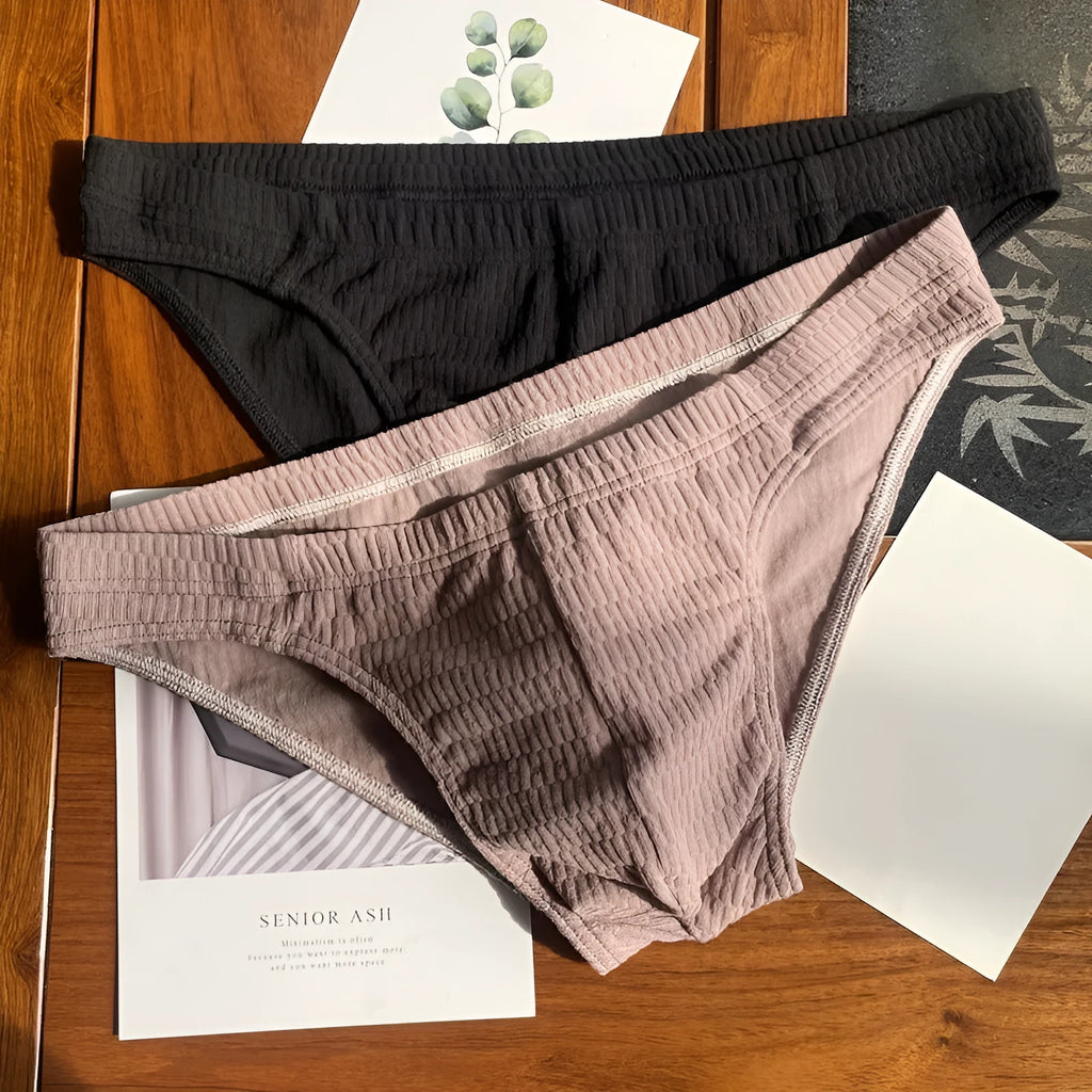 Men's cotton briefs in solid colours showing mid waist and triangle design