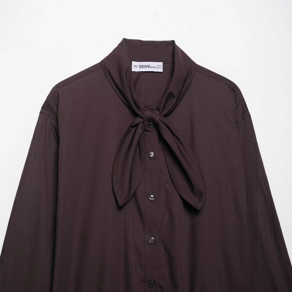 Brown women's poplin shirt with bow tie detail and long sleeves