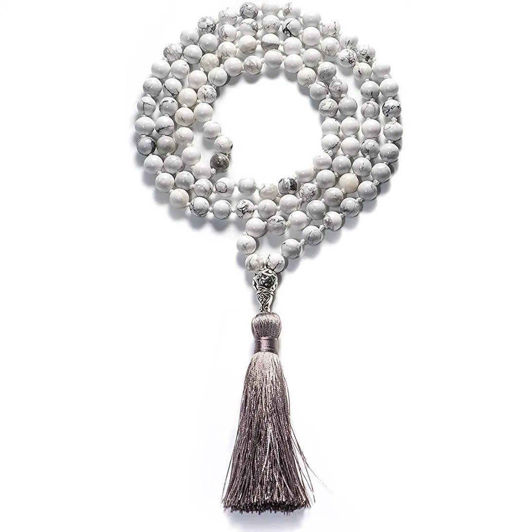 Long geometric agate necklace with tassel pendant in natural stone colours on a 95-100cm chain.