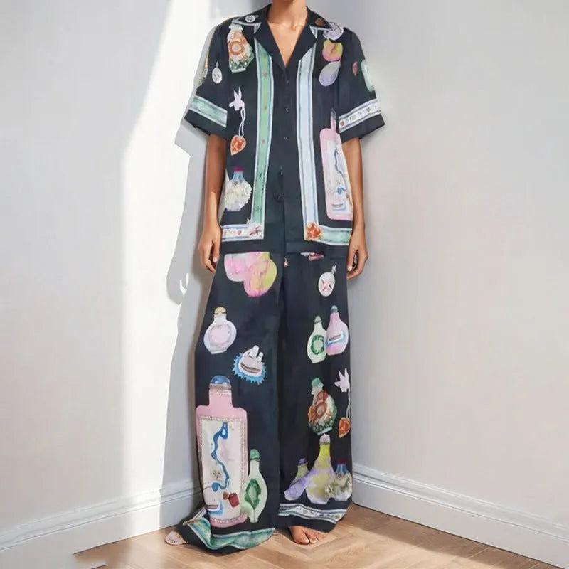 Black women's cardigan and pants set with cartoon animation pattern