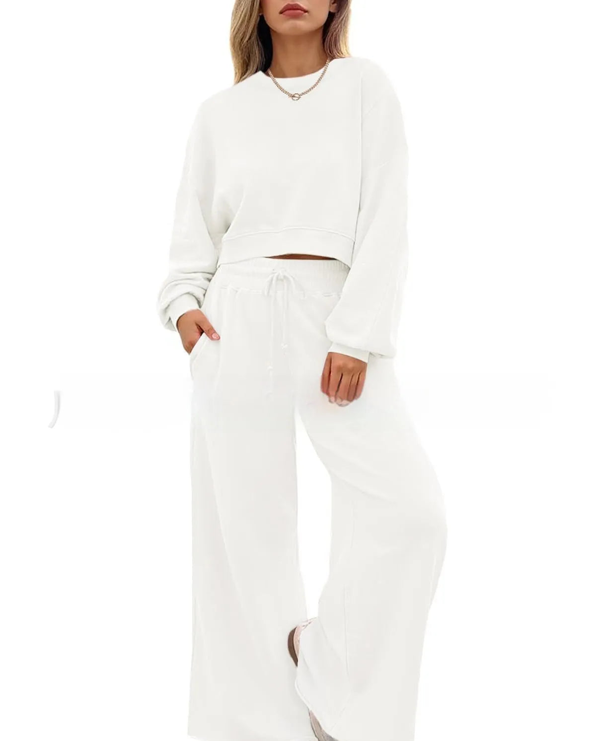 Women's solid colour polyester two-piece casual set with long sleeves and trousers.