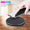Black Quick Qi wireless charging pad for iPhone 11 and Android phones with LED indicator