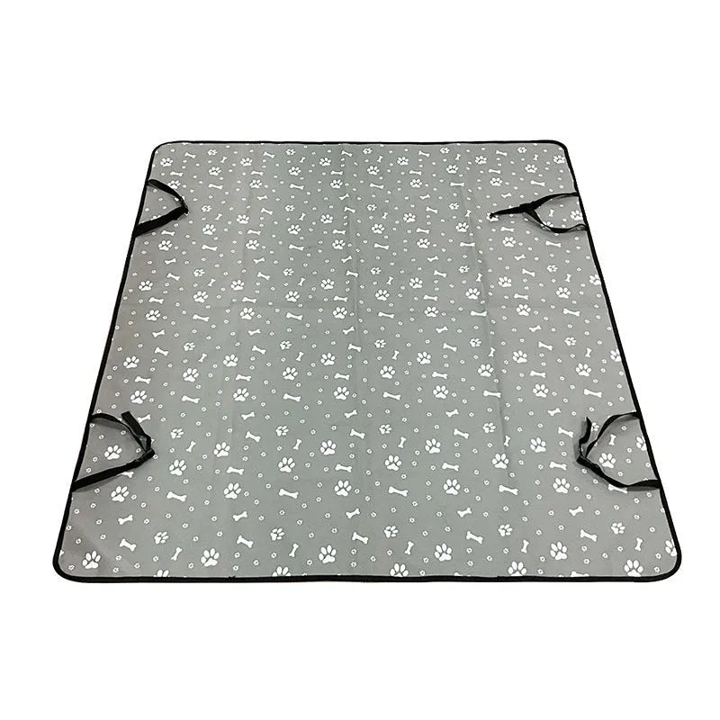 Washable cloth car pet mat for rear seat protection with dog bone print design.