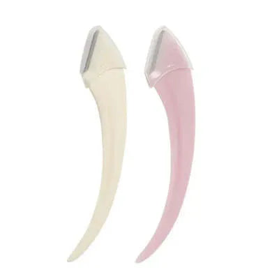Close-up of a curved moon-shaped eyebrow trimming knife with a comb, in pink and white colours.