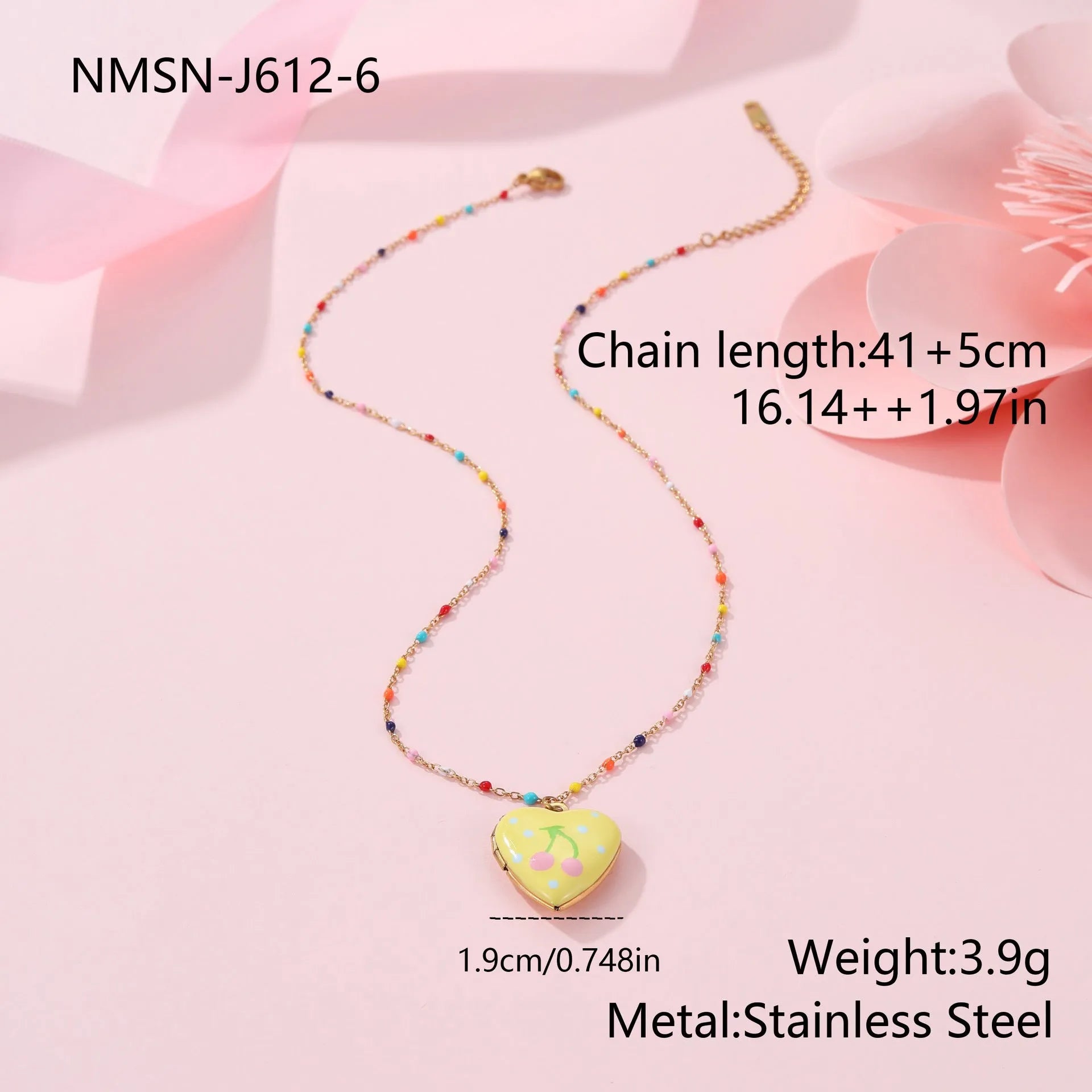 Gold-plated heart-shaped fruit pendant necklace on a stainless steel chain, showing grape design detail.