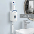 Wall-mounted automatic toothpaste dispenser in blue colour with touch sensor.