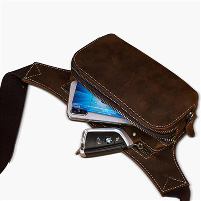 Brown top layer cowhide men's sports waist bag showing pull closure and internal mobile phone pocket