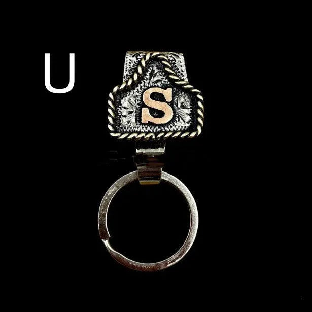 Handmade metal cow tag belt key holder with personalised alphabet letter