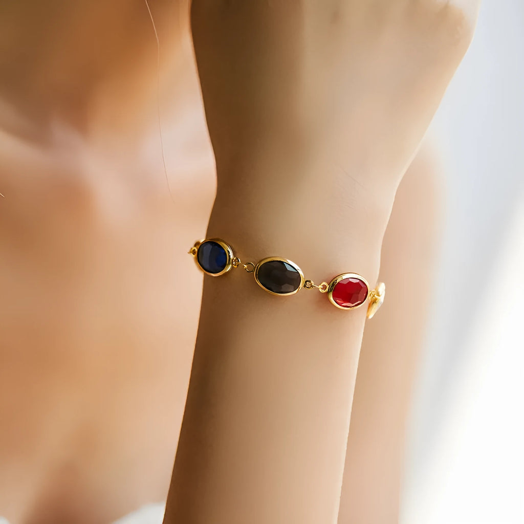 Women's geometric bracelet with blue glass inlay on a copper band.