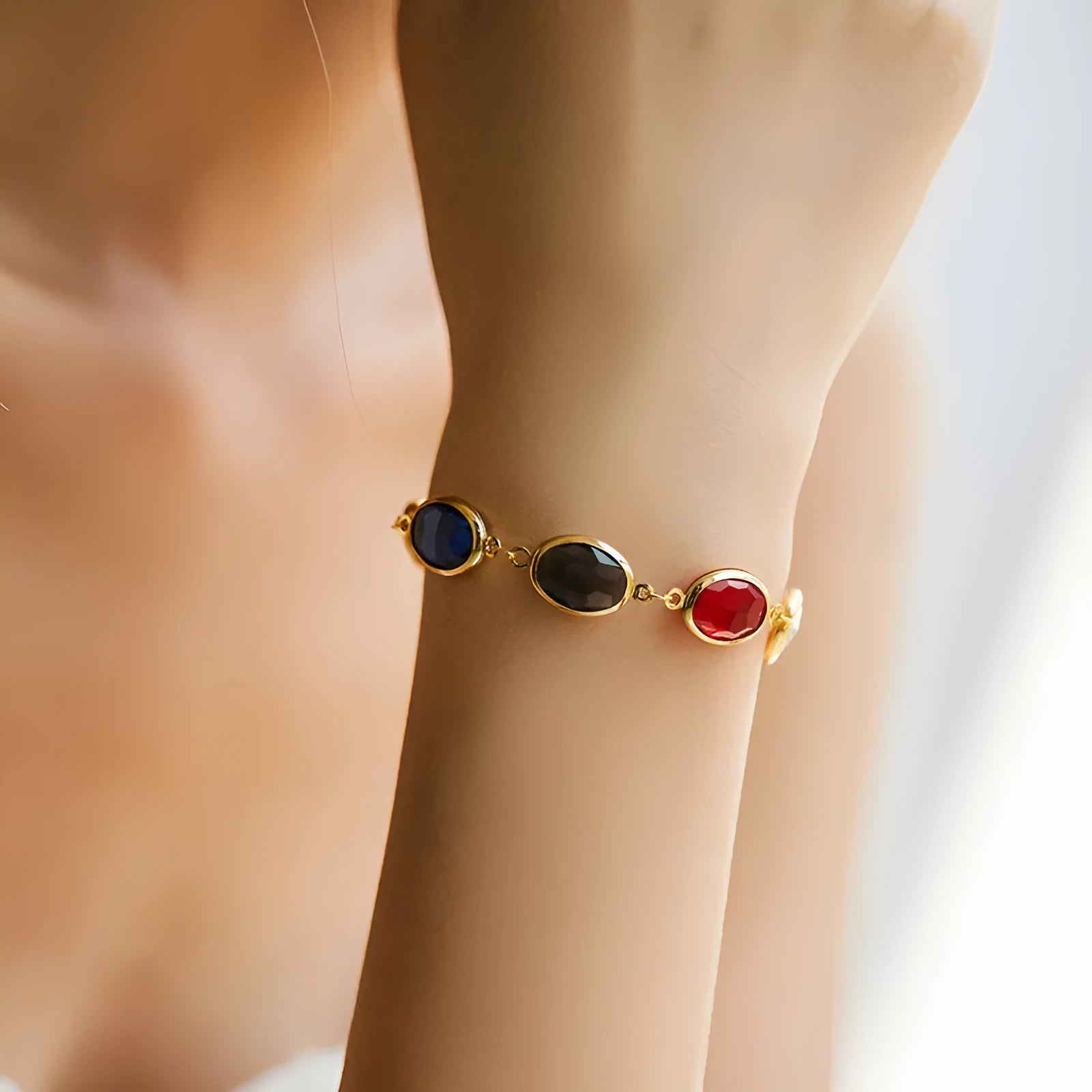 Women's geometric bracelet with blue glass inlay on a copper band.