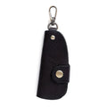 Handmade genuine leather key case for car keys in short length on a table