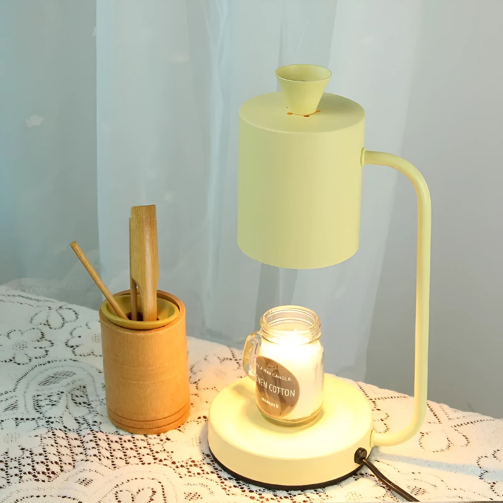 White European romantic style aromatherapy wax melt lamp with dimmer switch on a table.