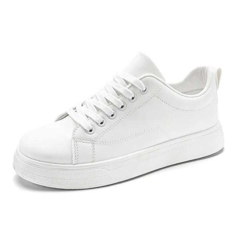 Men's Korean-style low-top sneakers in white, black, or two-tone colour with flat rubber sole