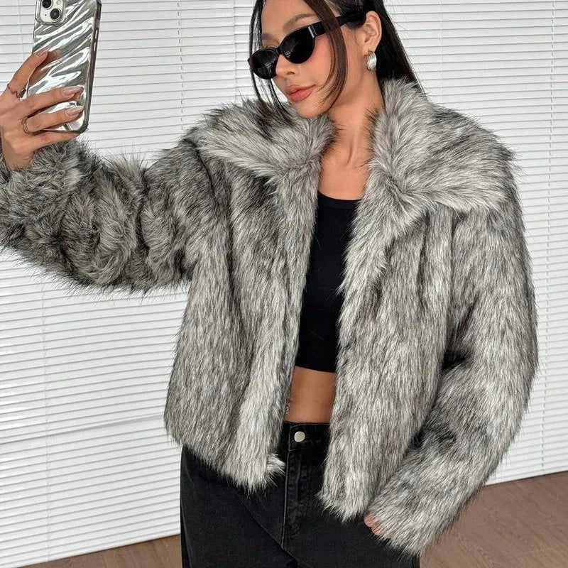 Women's faux fur coat with fur collar in black tip on black background colour