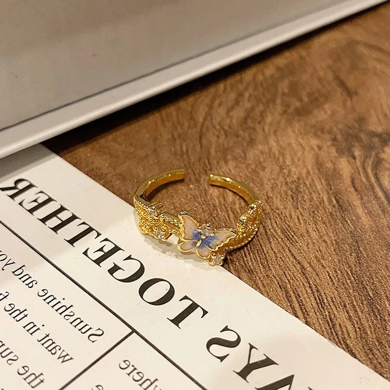 Copper Chinese butterfly women's ring showing creative design with oil dripping treatment finish