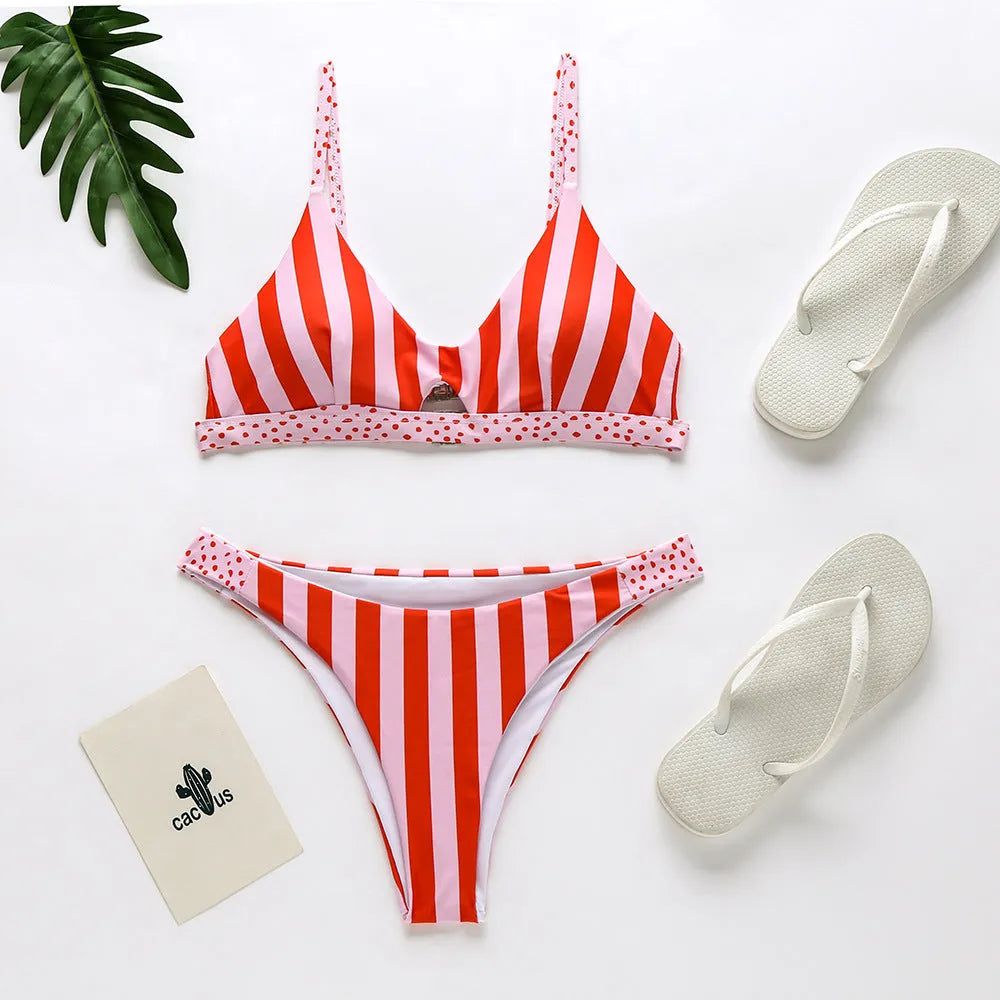 Women's polyester bikini swimsuit set in black and white dots pattern.