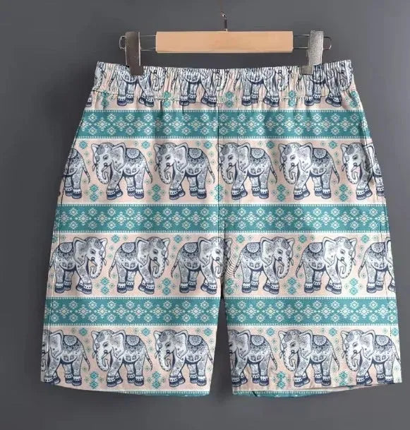 Men's casual polyester shorts in camouflage print, laid flat to show size and pattern.