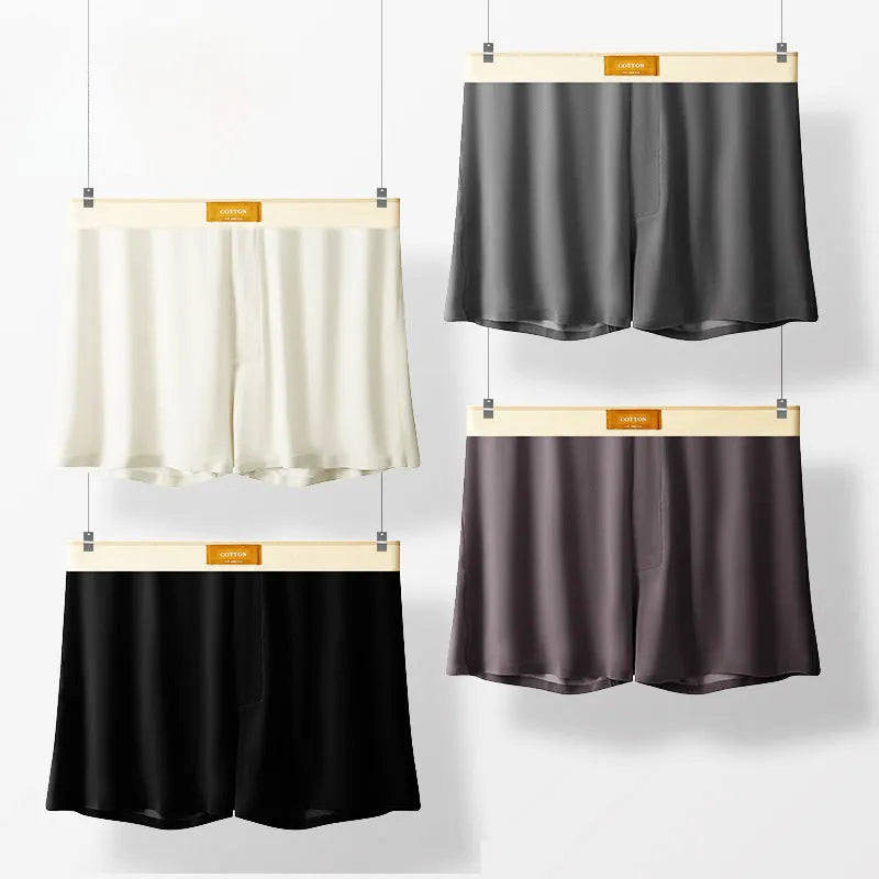 Men's loose fit ice silk underwear in solid colours showing mid-waist design and breathable fabric texture.