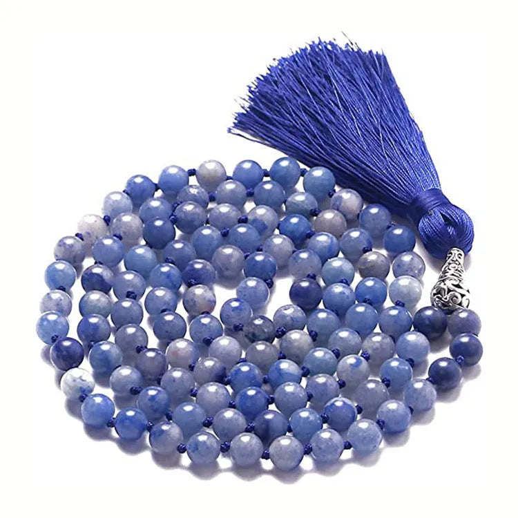 Long geometric agate necklace with tassel pendant in natural stone colours on a 95-100cm chain.