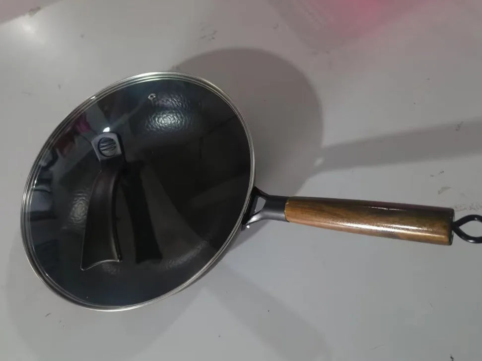 Traditional black iron wok pan with wooden handle and glass lid option