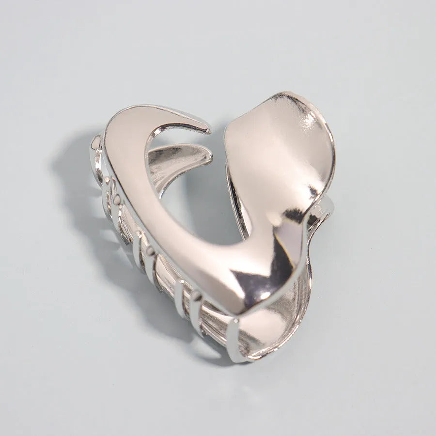 Silver metal hair barrette claw clip with electroplated finish and decorative design
