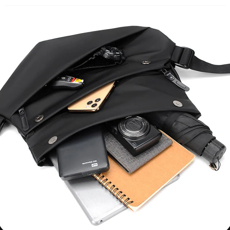 Grey PU leather crossbody bag showing internal phone pocket and document sleeve organisation