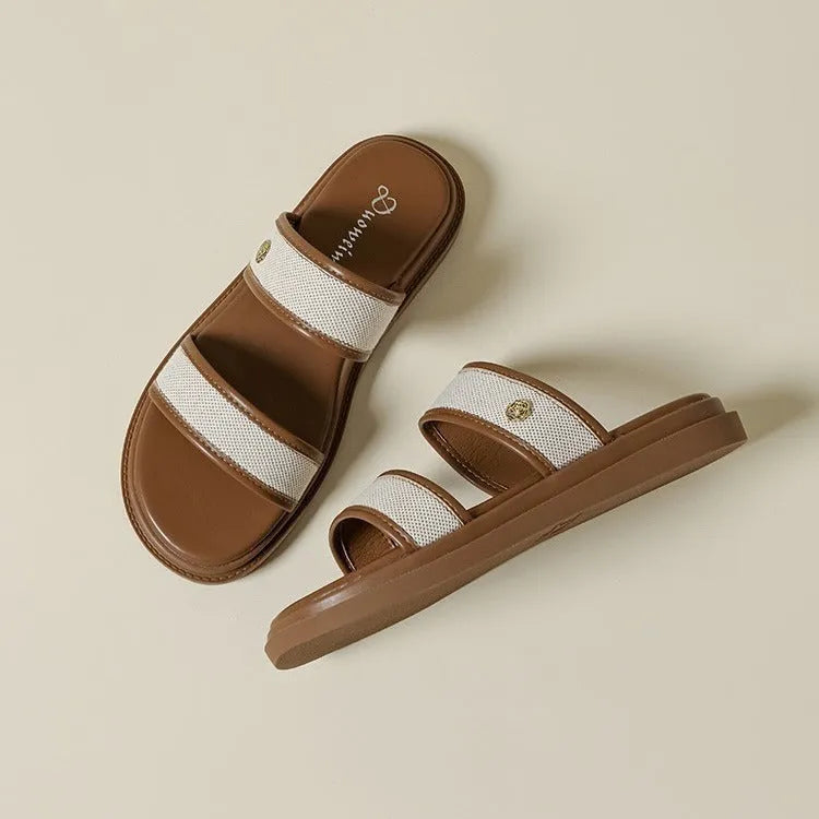 Women's vintage brown flip-flops with soft-bottom construction and retro design