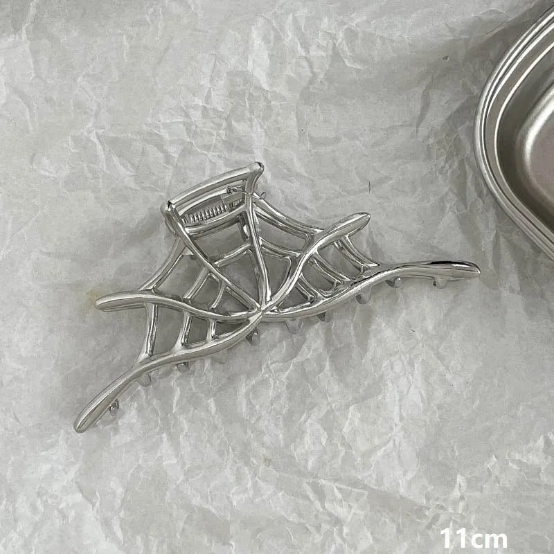 Silver metal hair barrette claw clip with electroplated finish and decorative design