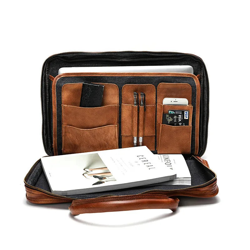 Large vintage leather men's briefcase with internal computer and camera pockets measuring 42cm wide