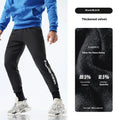 Men's black ankle-tied sweatpants with mid-waist design and polyester-spandex blend fabric