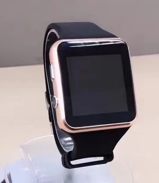 Black smart watch with 1.54 inch touchscreen and silicone strap on a wrist.