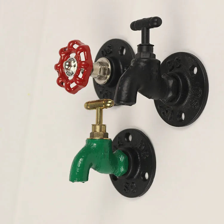 Water pipe style metal towel rack hook wall mounted in modern bathroom setting
