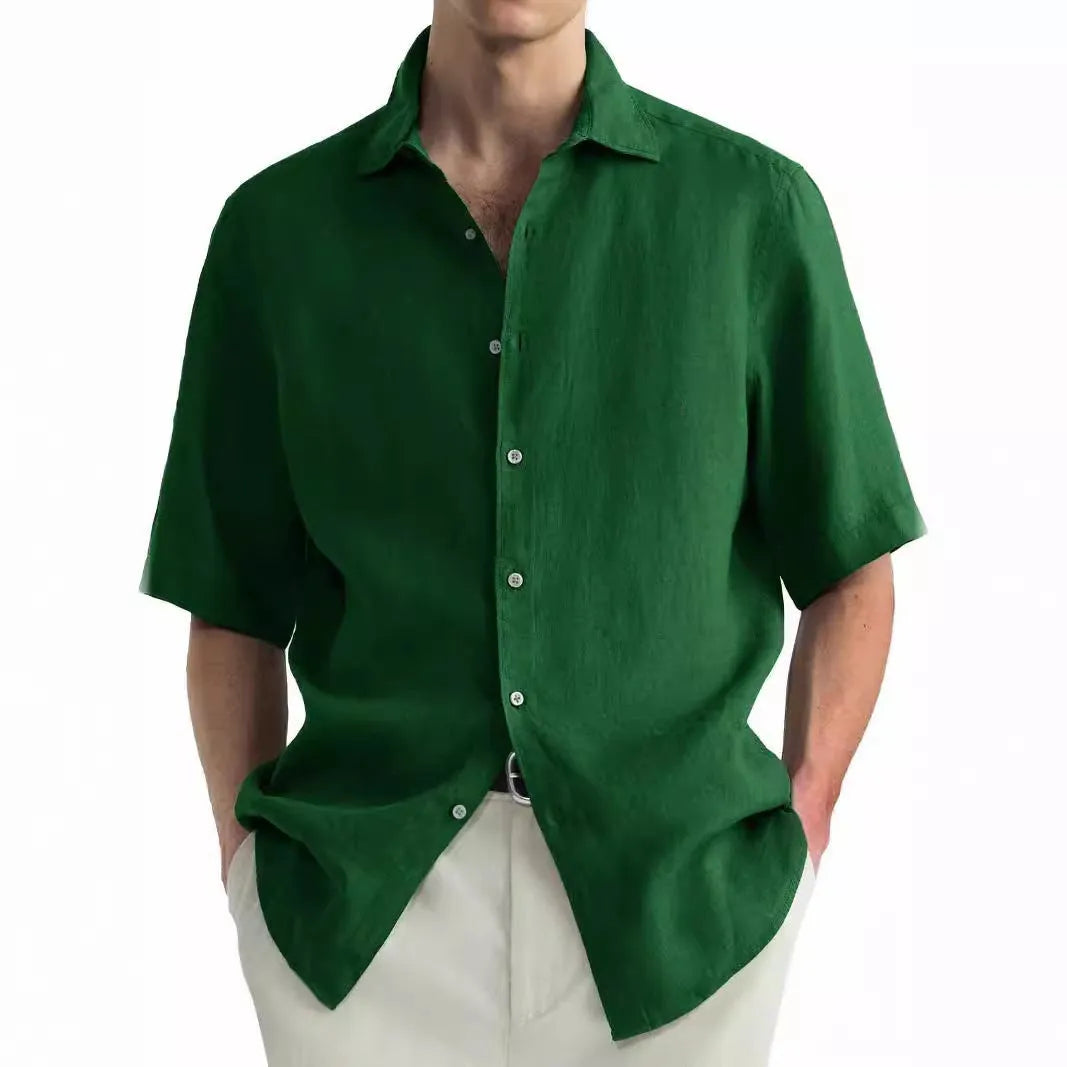Green men's casual cardigan shirt made from washed cotton, shown on a model.
