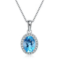Four-piece 925 sterling silver jewellery set with blue topaz stones: geometric necklace, earrings, ring, and pendant.