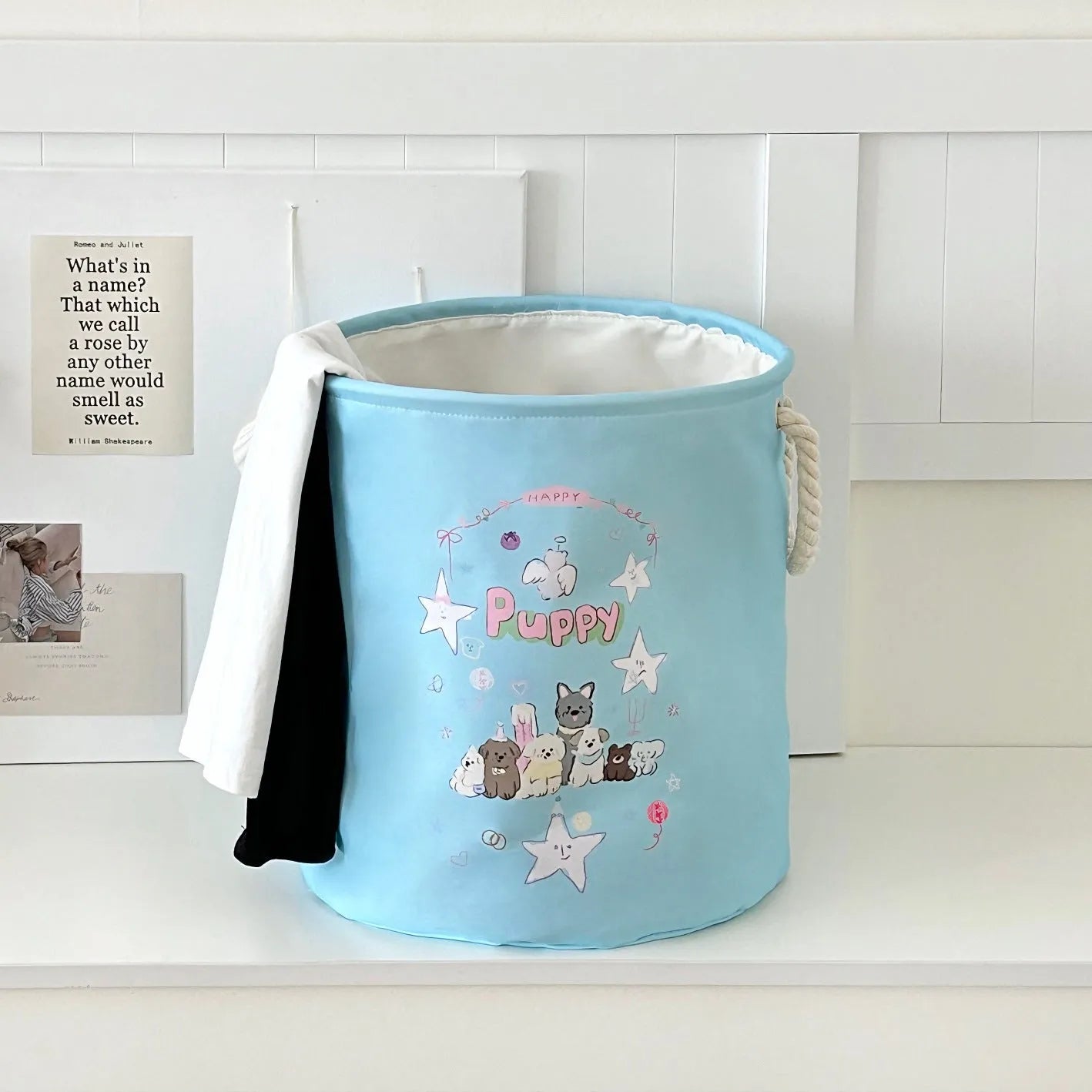 Foldable cotton laundry basket in a colourful design, shown unfolded for use.