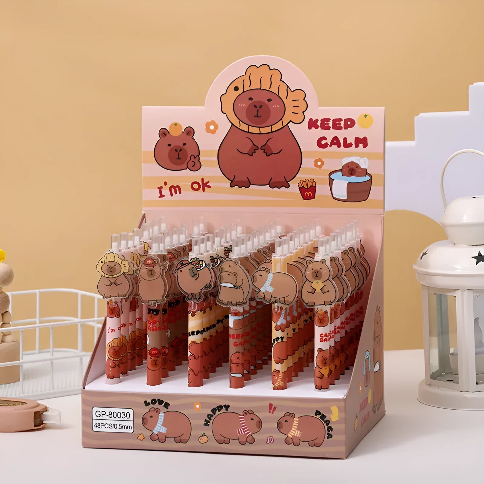 Box of 48 cartoon bear acrylic paster gel pens with black ink on a white background.