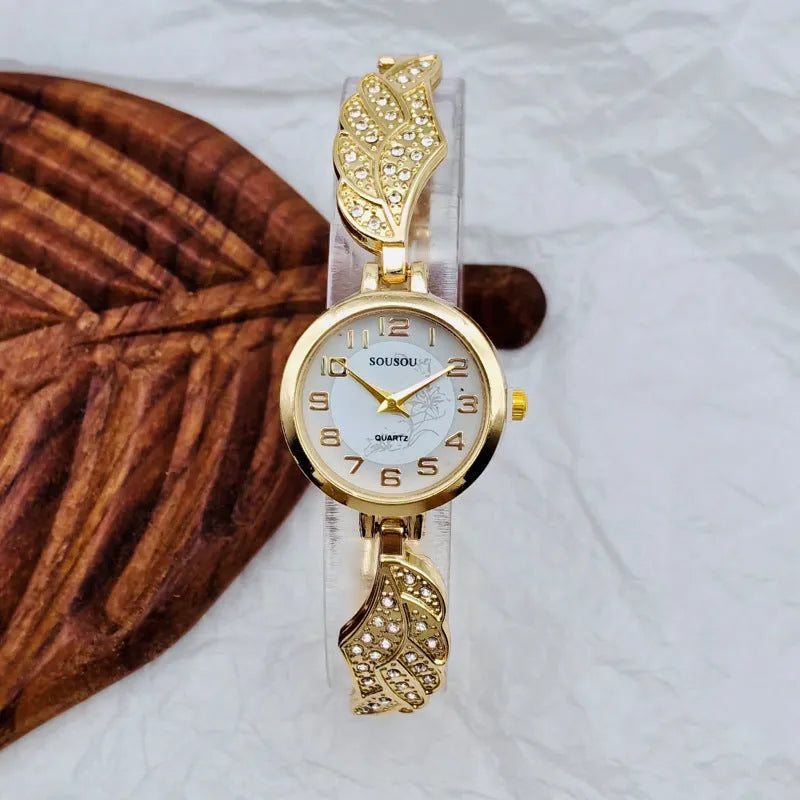 Stainless steel ladies watch with round dial on metal strap with Vachette clasp