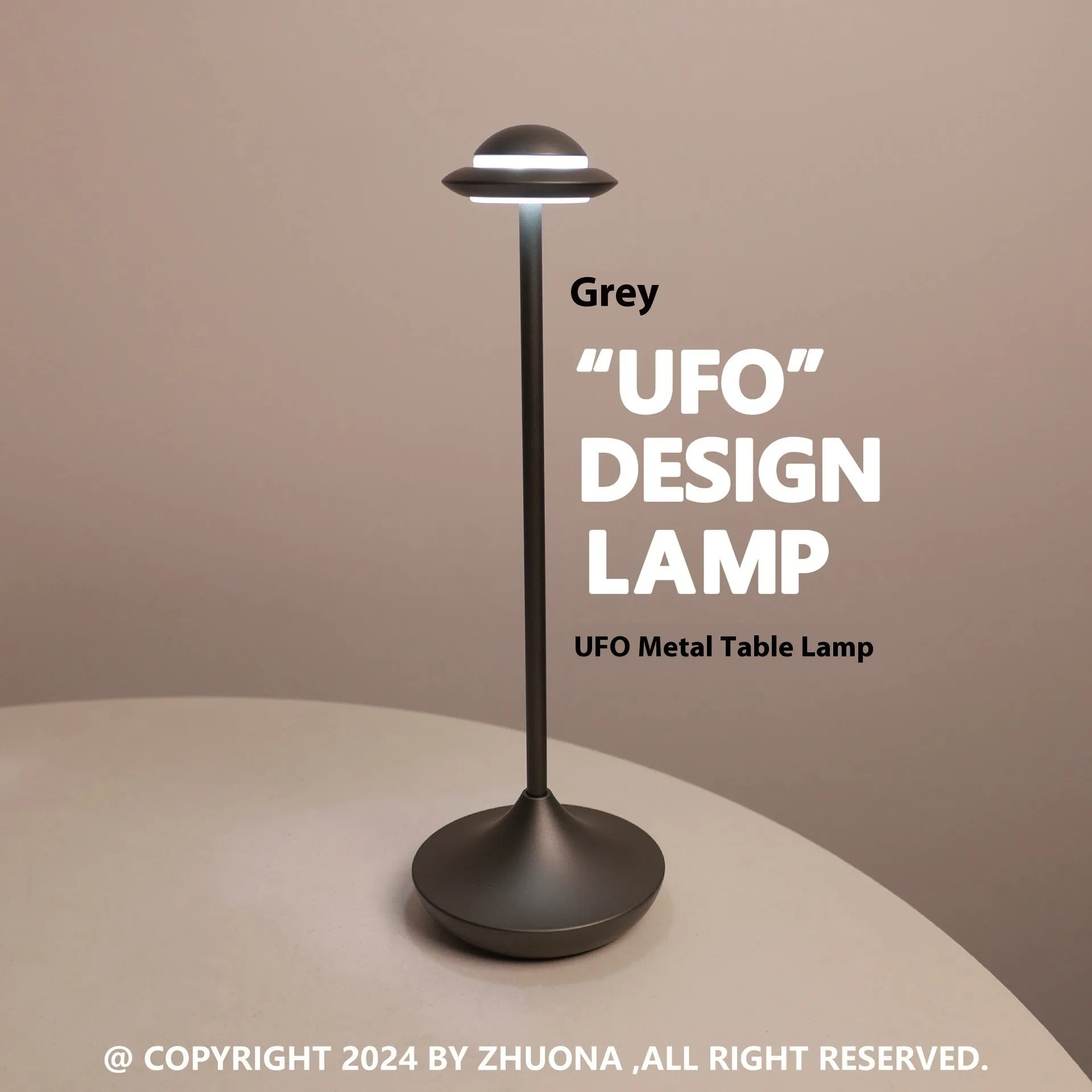 Metallic UFO-shaped desk lamp with touch controls in black finish on wooden surface