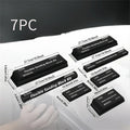 Set of seven black frosted EVA building blocks with visible metal connector fittings.