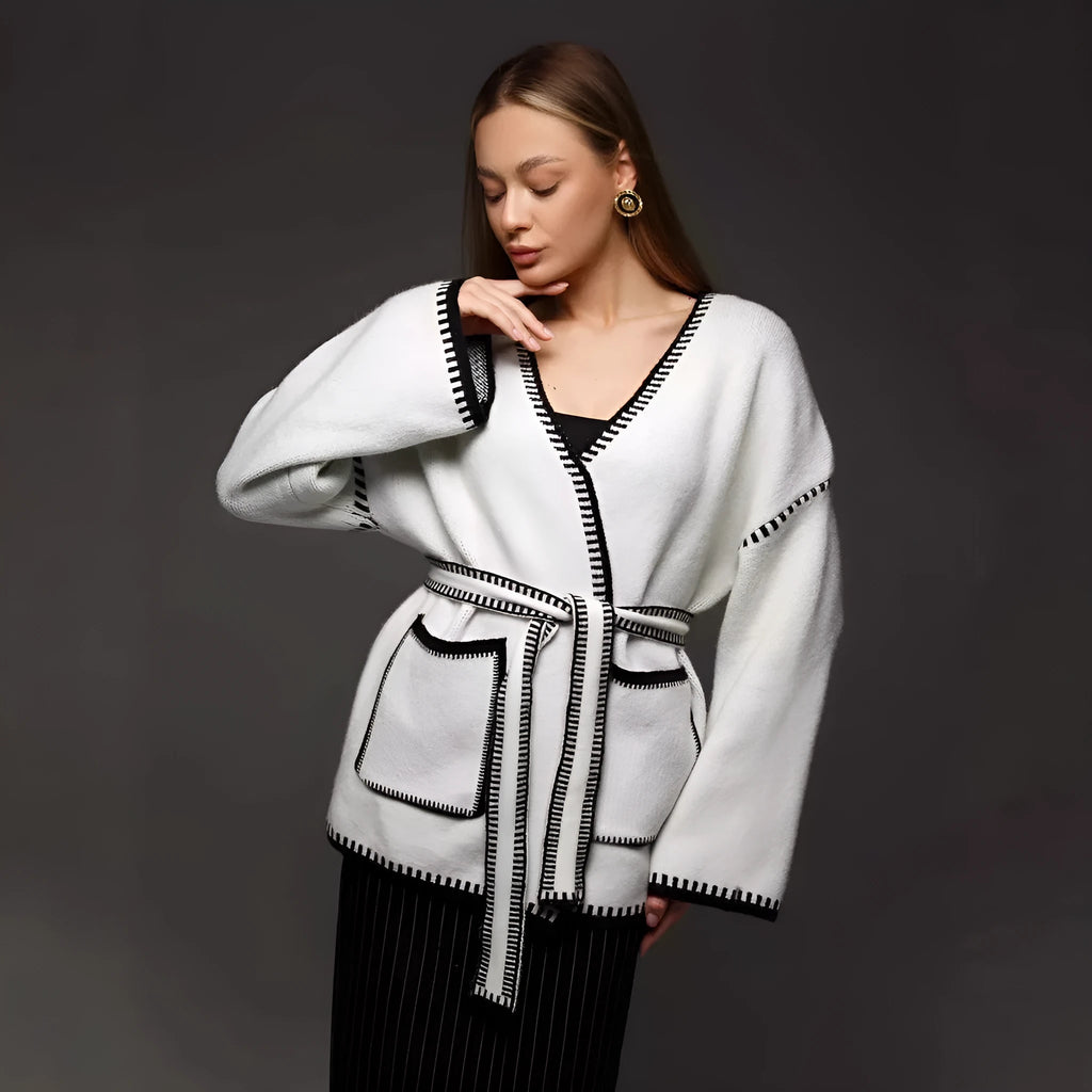 Lace-up front knitted cardigan in imitation cashmere fabric showing loose fitting design and long sleeves