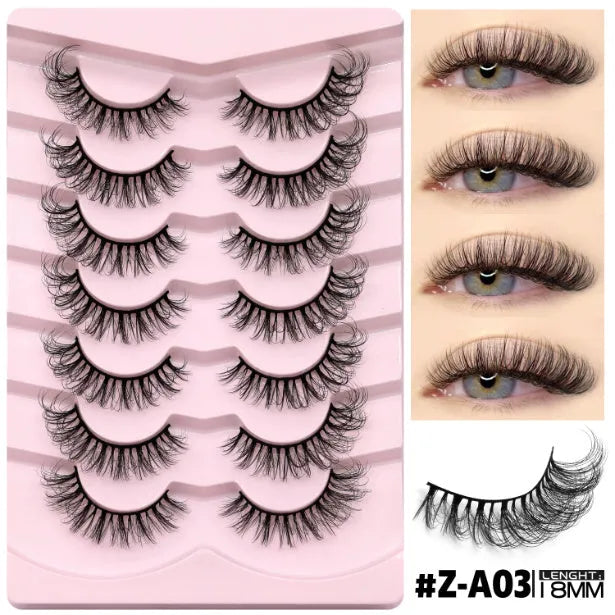 False eyelashes without eyeliner in thick natural long artificial fibre style with adhesive