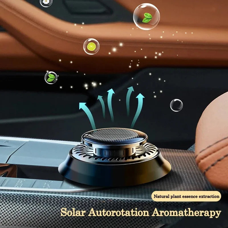Solar powered kinetic car air freshener with double ring rotating design