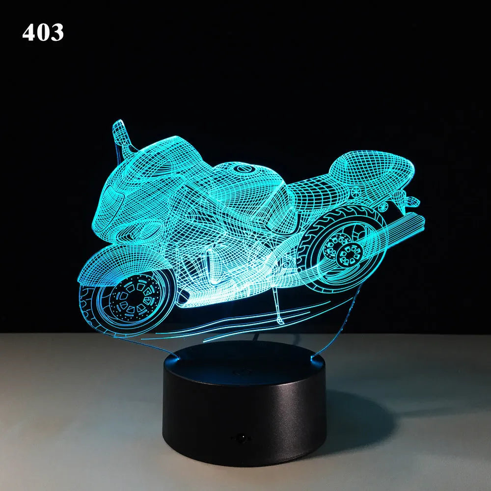 Motorcycle LED desk lamp with black base and acrylic shade showing orange colour
