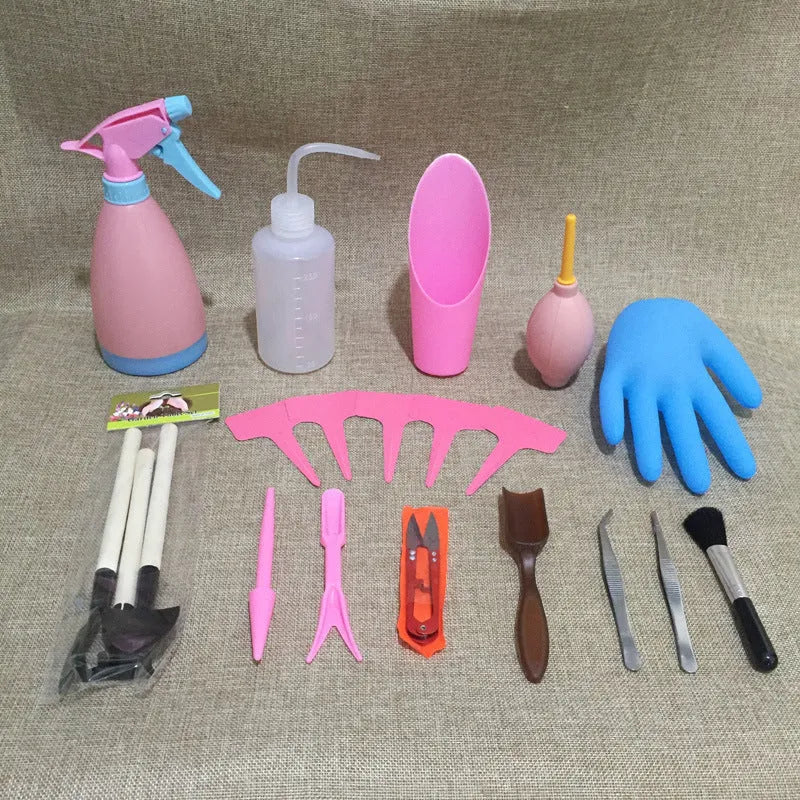 14-piece succulent gardening tool set showing miniature watering can, soil tools, tweezers and brush