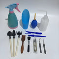 14-piece succulent gardening tool set showing miniature watering can, soil tools, tweezers and brush