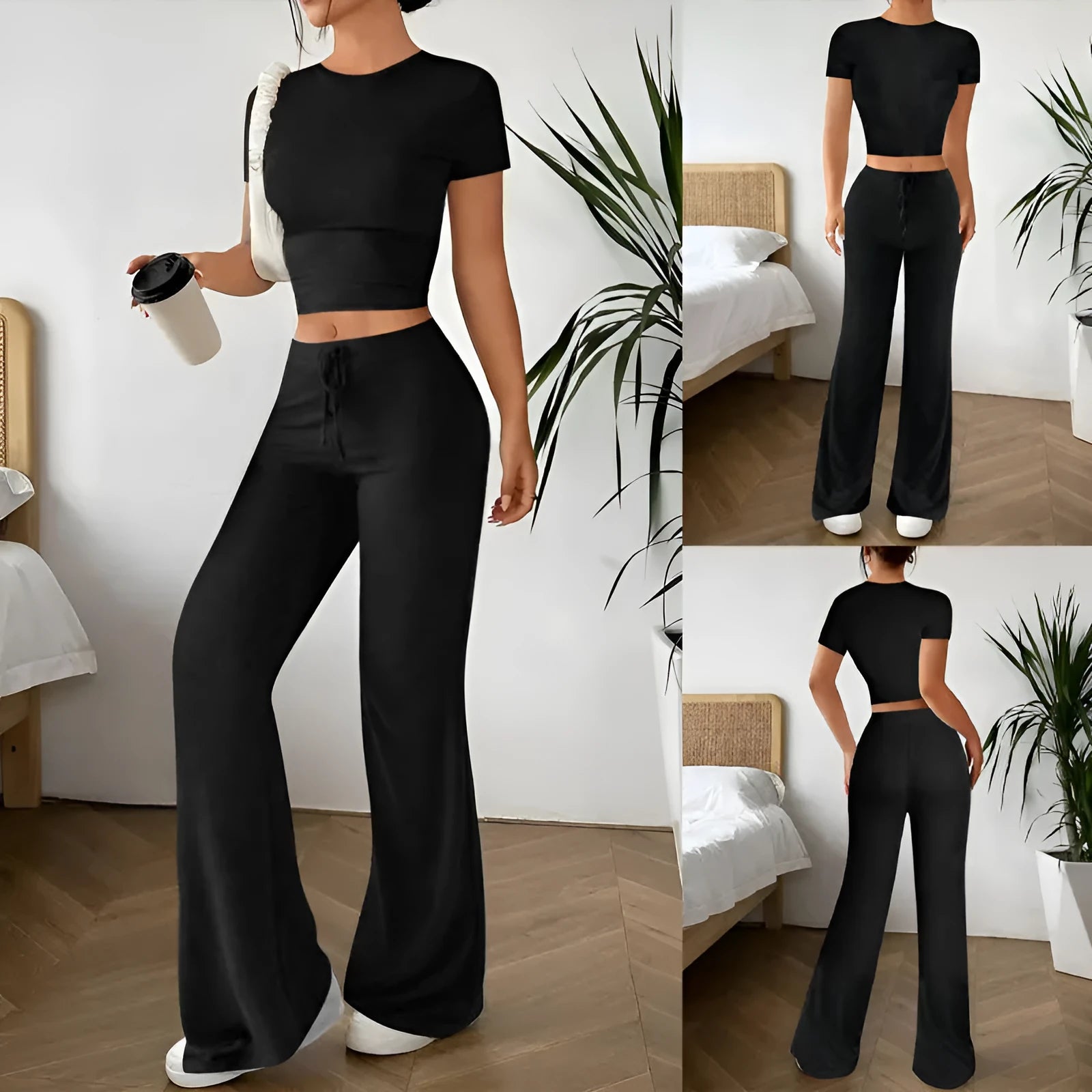 Black high waist trousers and short sleeve t-shirt women's co-ord set on a hanger.