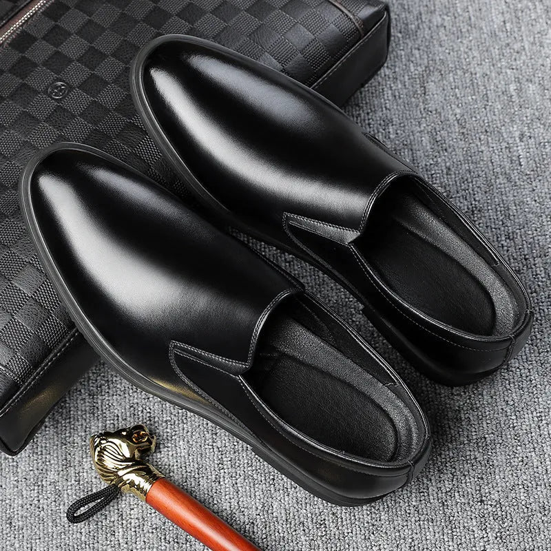 Men's black business casual slip-on leather shoes with a low-top design and rubber sole